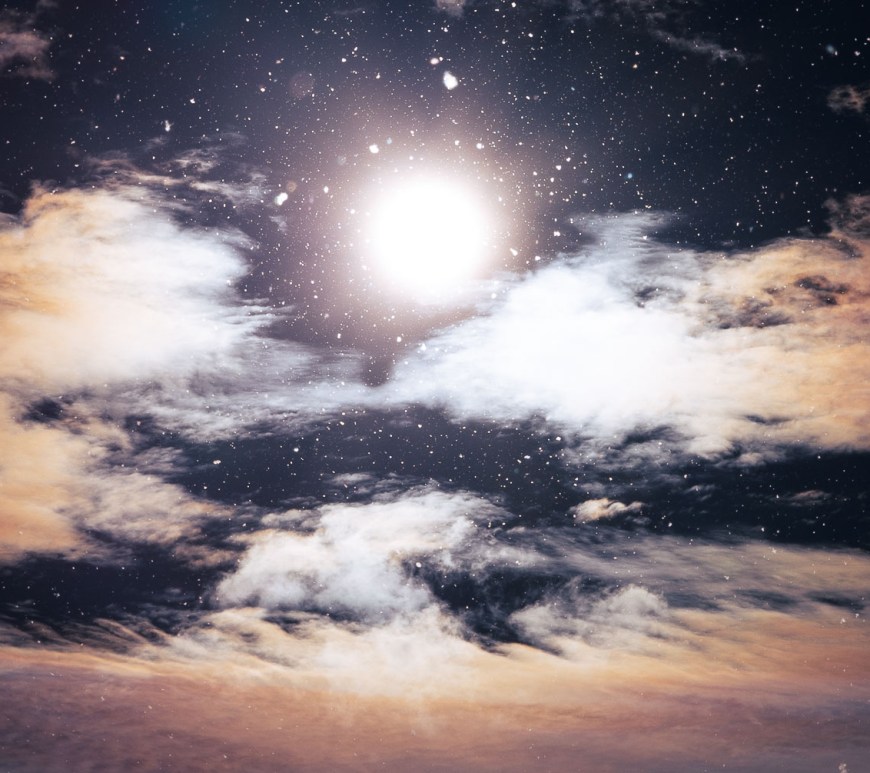 Poplar puffs float in front of cloudy sunny sky