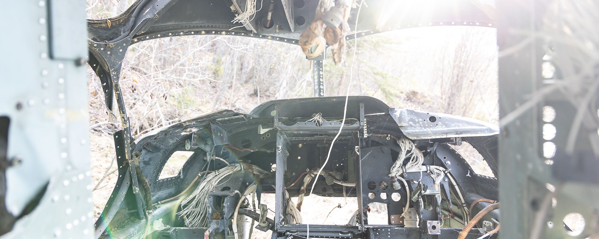 Ruined cockpit of an abandoned airplane.