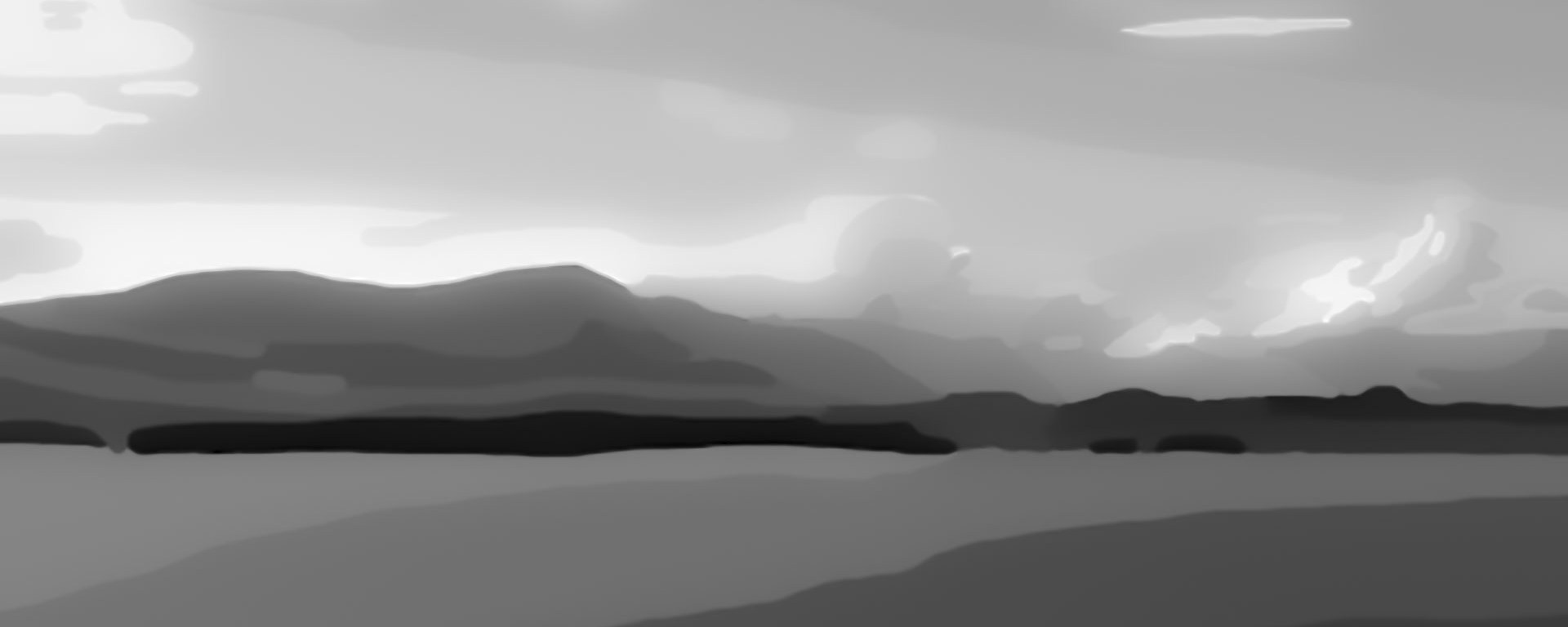 A grey ocean side landscape.