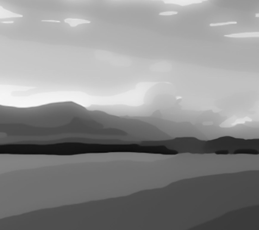 A grey ocean side landscape.